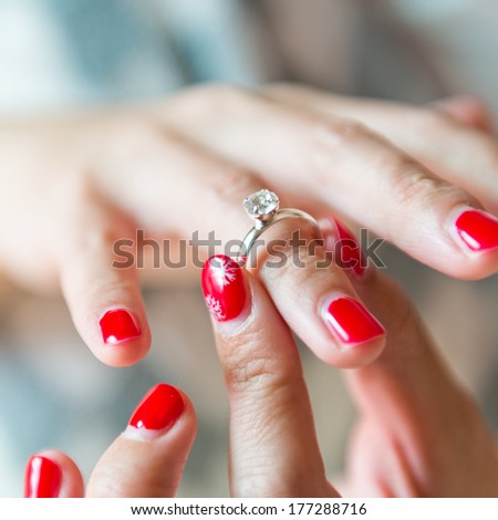 Wedding rings in woman hand.