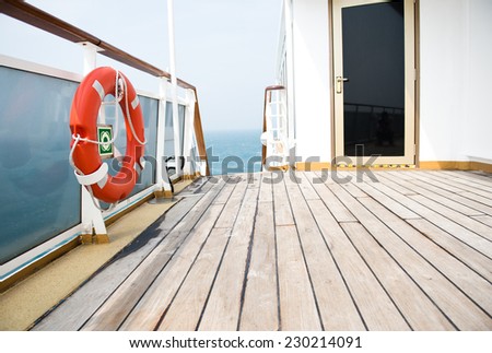 Life buoy on the deck of cruise ship.
