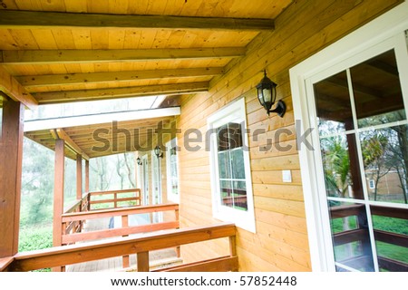 Front porch of log cabins.