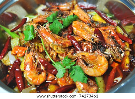 group of cooked orange shrimp with piquancy. Chinese food.