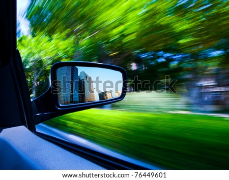 car driving fast escape the city into forest.