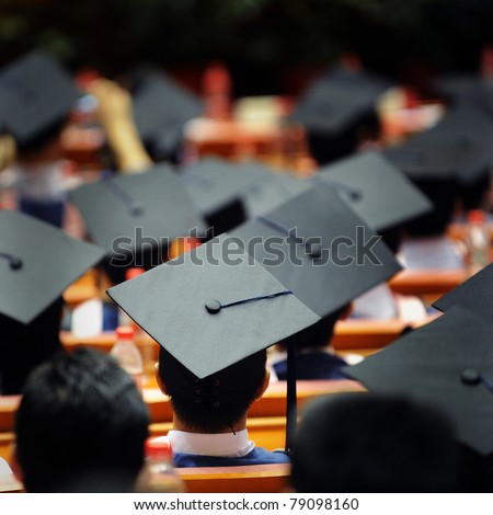 Shot of graduation caps during commencement.