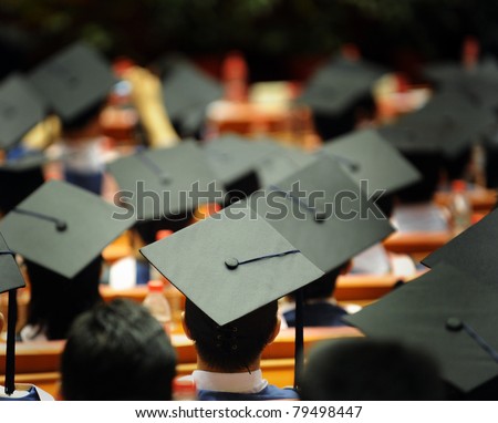 Shot of graduation caps during commencement.