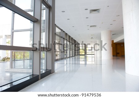 empty long corridor in the modern office building.