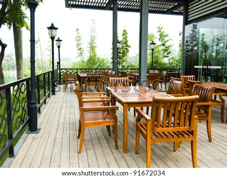 House patio with wooden patio furniture