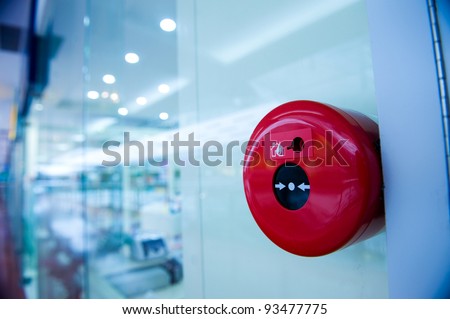 fire alarm on the wall of shopping center.