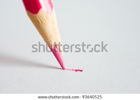 Close up of pencil writing on paper. Macro with extremely shallow depth of field