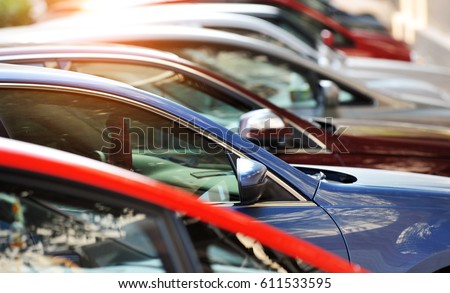 Group of cars parked in a row
