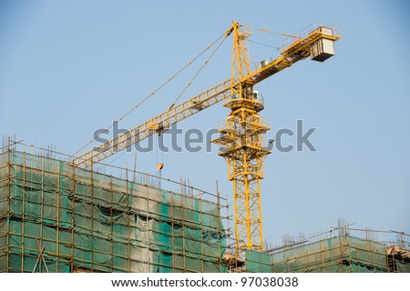 Cranes on a construction site in China.