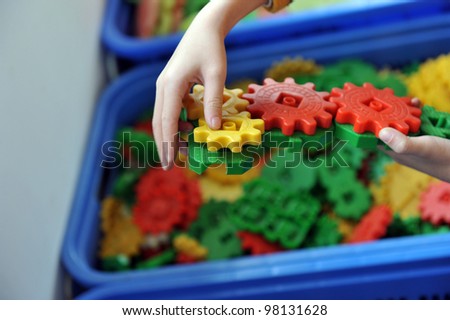 boy's hands keeping slice puzzle try its collect.