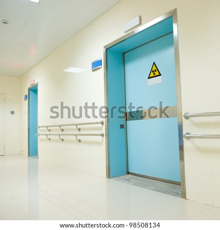 corridor in hospital with doors.