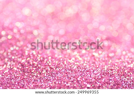 Gold pink nuggets sparkling carpet. Close-up view, very shallow deep of field . Macro.