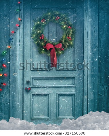 Rustic barn door with Christmas wreath