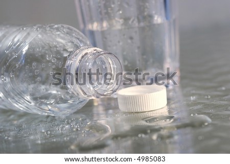 Empty bottle of water on stainless steel counter