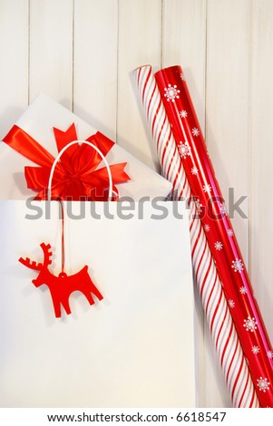 Gift with white shopping bag and wrapping paper