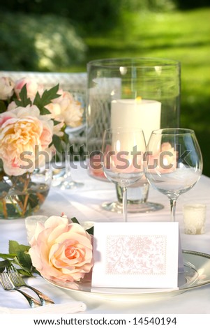 stock photo Place setting and card on a table at a wedding reception