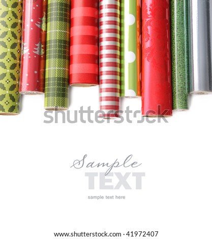 Rolls of colored wrapping  paper on white background
