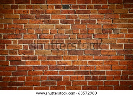 Weathered stained old brick wall background