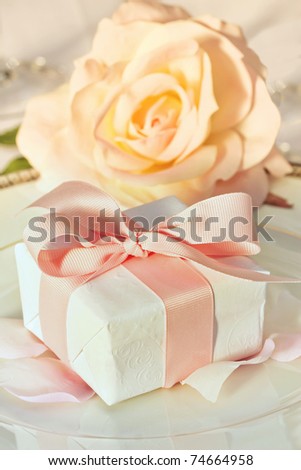 stock photo Small thank you gift on plate at wedding reception