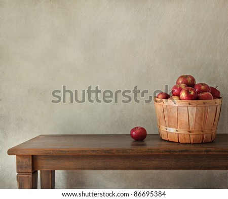 Resh apples on wooden table with lots of copy-space
