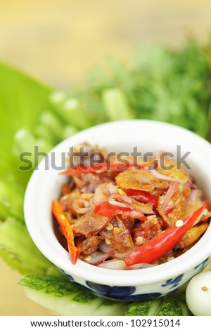 Thai Cuisine -  Shrimp in chili sauce - Shrimp paste - thai hot and spicy sauce with herb and vegetables - namprik - thai chili sauce with crispy shrimp and herb