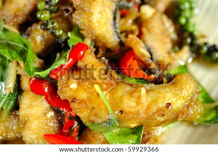 fried fish-fried giant catfish with herb and spicy