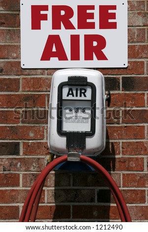 free air sign over air pump