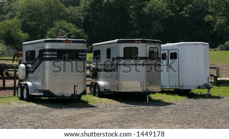three horse trailers