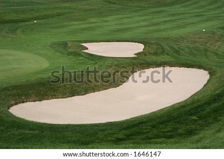 two sand traps on golf course