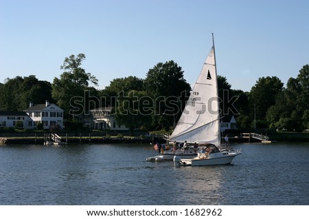 people sailing and boating