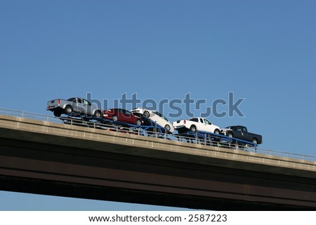 car transporter crossing bridge