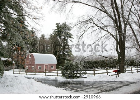 beautiful winter landscape with pink barn