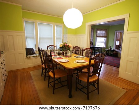 beautiful dining room with table set for dinner