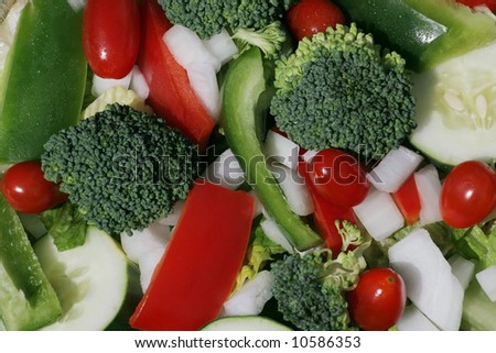 garden salad with broccoli,green and red peppers,onion, cucumber, tomatoes