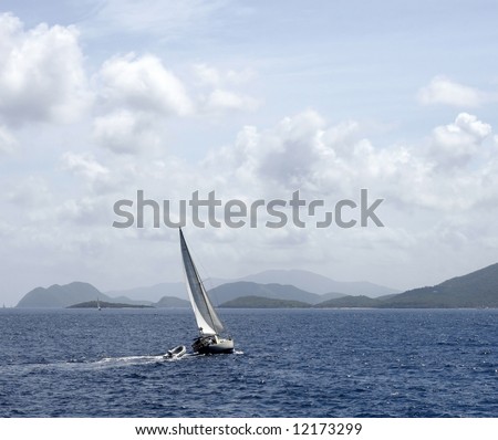 beautiful sailboat in ocean with scenic view