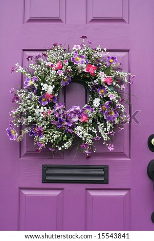beautiful wreath on purple door