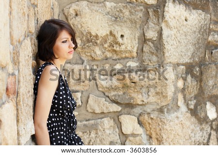 Fashion model - leaning on ancient wall - check my portfolio for more pictures
