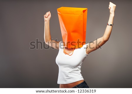 stock-photo-shopping-metaphor-woman-with-shopping-bag-over-her-head-12336319.jpg