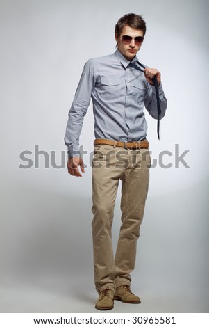 أزياء شبابية Stock-photo-dynamic-image-of-a-handsome-young-man-shot-in-studio-30965581