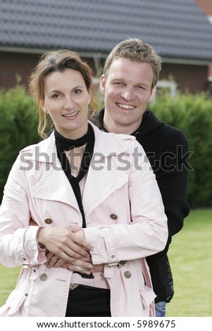 Portrait of a happy couple in their garden