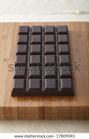 chocolate bar on wooden board