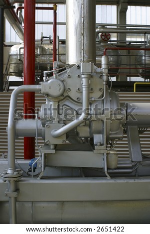 industrial compressors and pipe work in factory