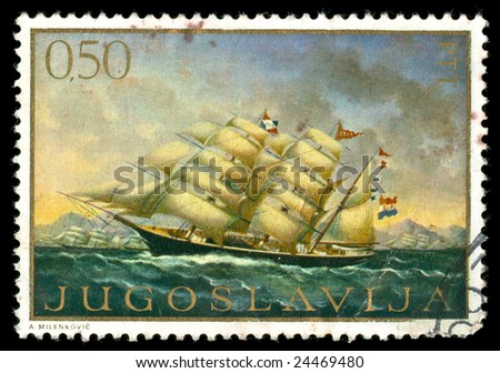 vintage stamp depicting a sailing ship under sail