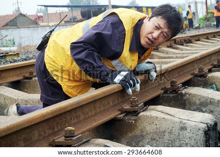 Anhui Huaibei China, June 20, 2015. Railway workers laid the railway. By 2015, China\'s railway mileage will reach 120000 kilometers or more.