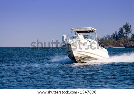 Pleasure boat cruising river