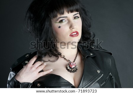 Hot rocker babe headshot wearing leather jacket