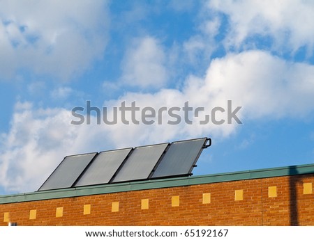 Solar panels on roof of small commercial building