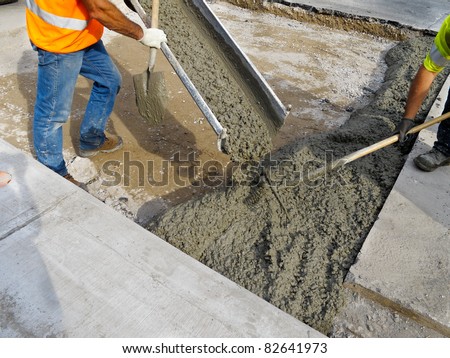 Pouring cement during Upgrade to residential street