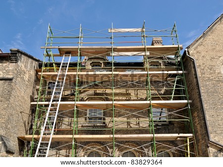 Scaffold erected for reconstruction of college building