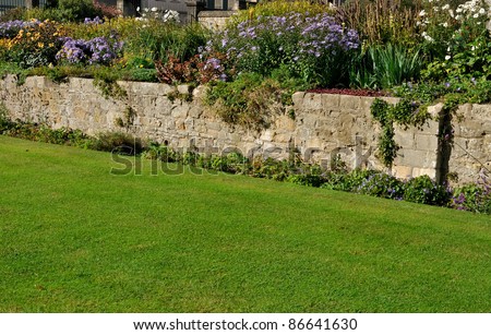 Stone Wall In Traditional English Garden Stock Photo 86641630 ...